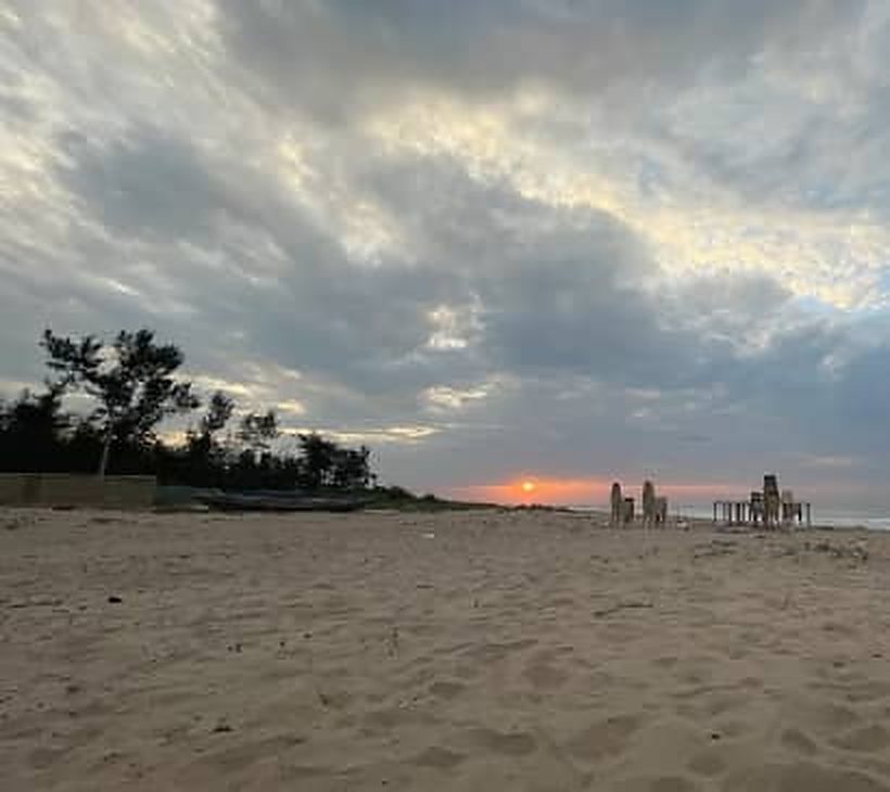 Sun setting over the sand near Vodarevu Beach, Chirala